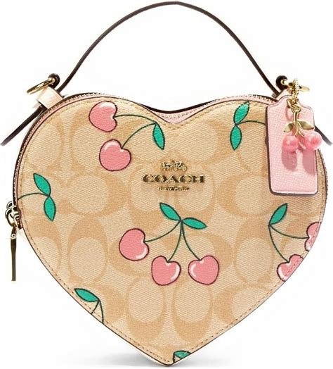 bolso de corazon coach